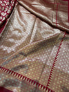 Patterned fabric with geometric design in brown and red
