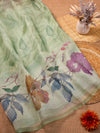 gysy sarees Floral patterned fabric on a woven surface with flowers and leaves.