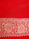 Red fabric with white floral embroidery