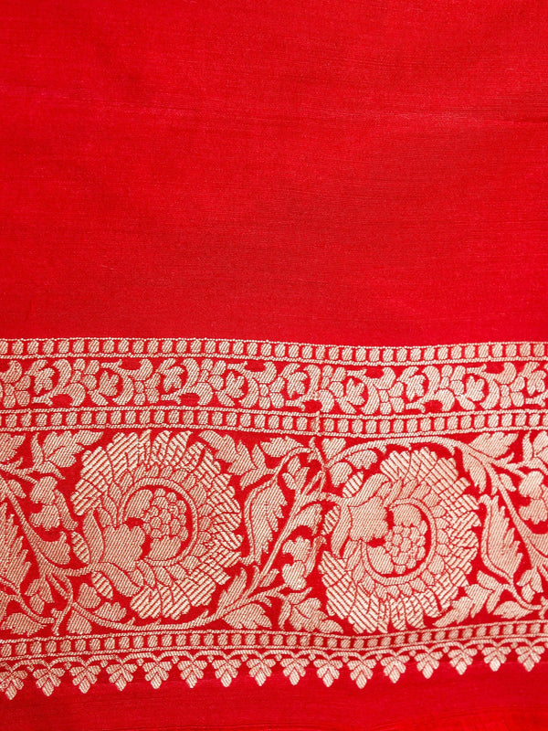 Red fabric with white floral embroidery