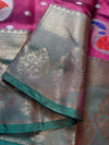 Saree with floral patterns in green and pink on a textured fabric background