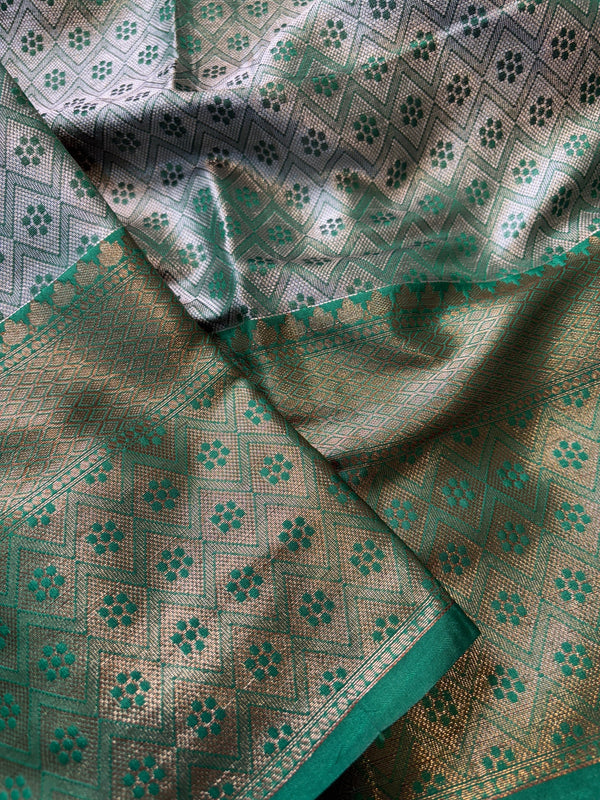 Close-up of patterned fabric with green and brown colors