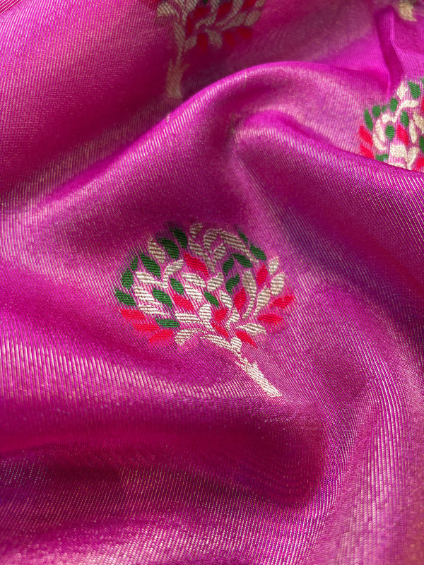 Close-up of a pink fabric with embroidered design
