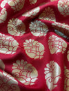 Red fabric with gold floral patterns