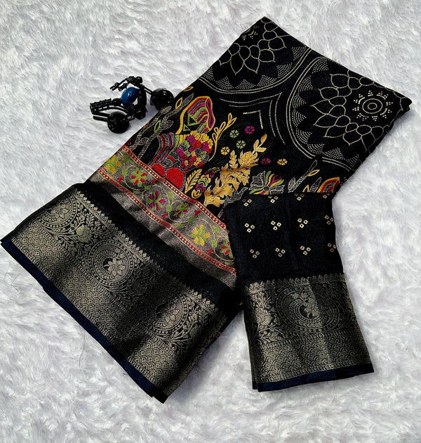 Black saree with colorful floral patterns on a textured white background